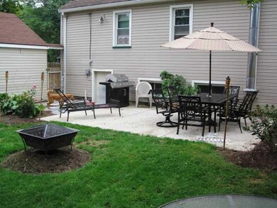 Exterior Back PROFESSIONALLY LANDSCAPED PATIO AREA