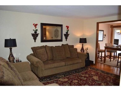 Living Room. View from front door. Note Hardwood t