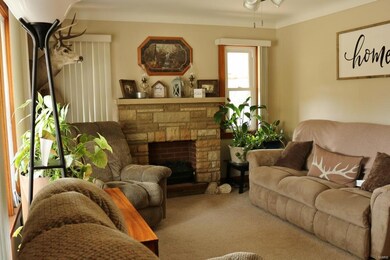 Living room features large windows for lots of nat