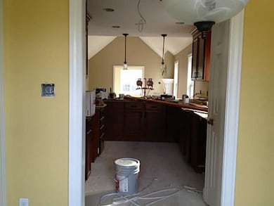 Kitchen looking from eat in nook to back of house