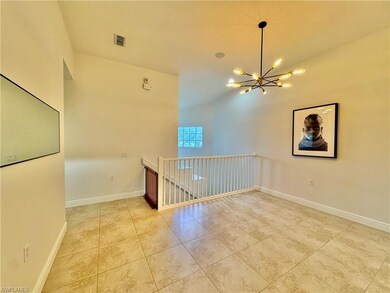 Unfurnished room with light tile patterned floors 