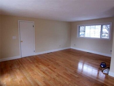 Living Room. Large sunlit living room with new har