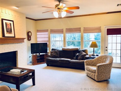 Family with wood burning Fireplace, lots of light