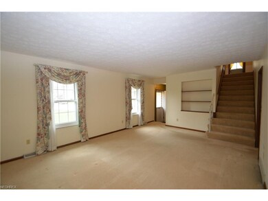 Living room view back to foyer entry