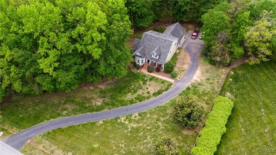 Aerial view of property and surrounding area