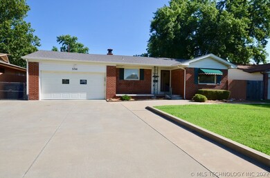 Extra wide parking - brick and vinyl exterior
