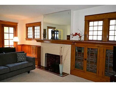Living Room. Note the original woodwork & built-in
