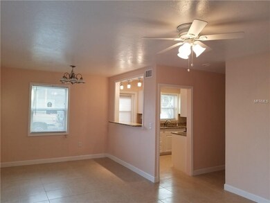 Dining space by the kitchen with open window