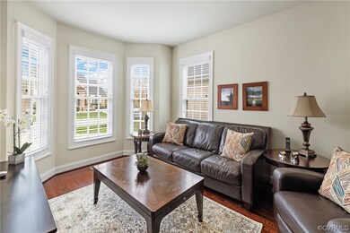 Living room/study w/ bay window