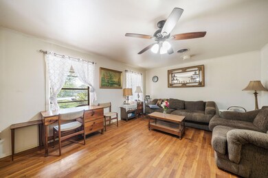 Living area featuring light wood finished floors,