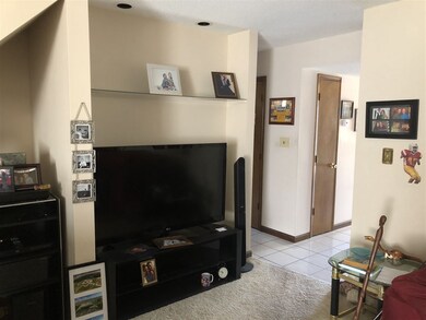 Large living room with vaulted ceilings.
