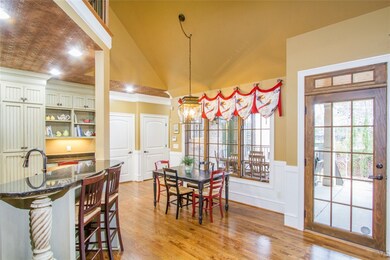Breakfast area with cathedral ceiling.