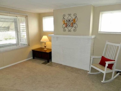 Living Room. Blinds new through out the home.