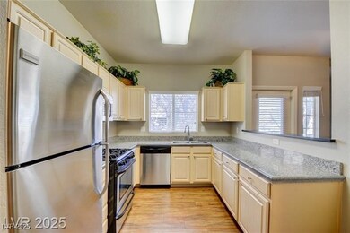 Kitchen featuring appliances with stainless steel