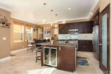 Open kitchen with oversized island, granite counte