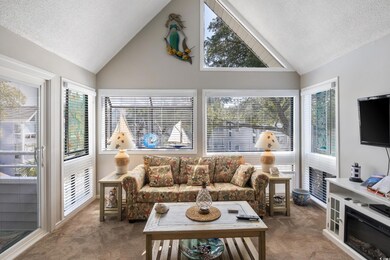 Sunroom featuring a healthy amount of sunlight and