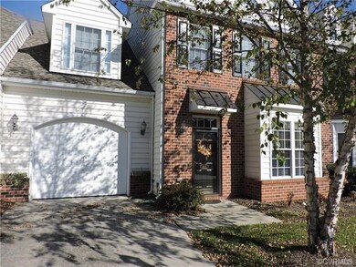 1-car attached garage with concrete driveway and s