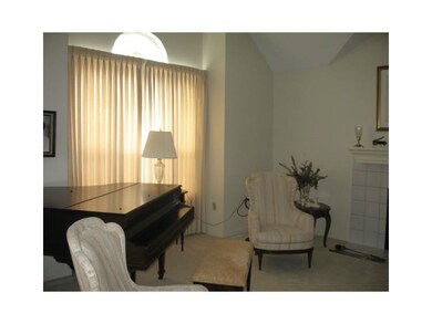 Living Room. Living Room with Double Windows and p