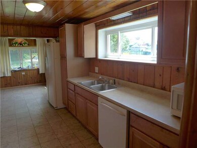 Kitchen. Galley kitchen with newer cabinets and ap