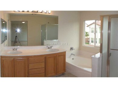 Master Bath/Spa. The master bath has dual sinks, a