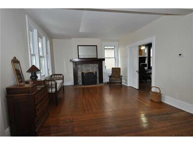 Living Room. Orginal hw floors accent this charmin