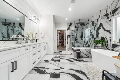 Bathroom with plus walk in shower and vanity