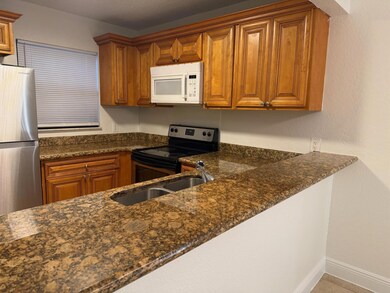 1760 Windorah Way unit D, West Palm Beach, FL 33411 - photo 2