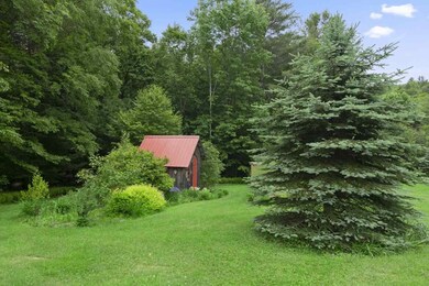 Sweet garden shed for the expansive gardens...