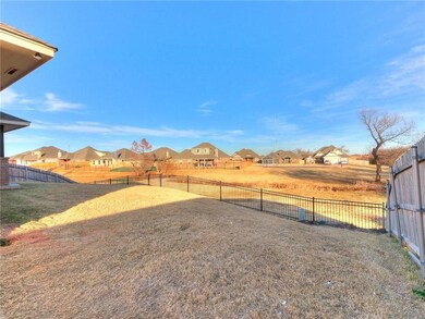 Yard overlooking the serene greenbelt and pond. Ro