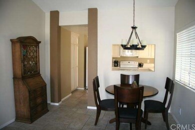Eating area and pass-through to kitchen.