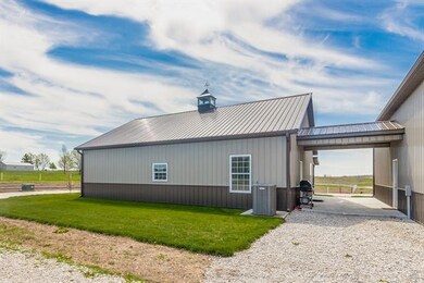 The breezeway is perfect for grilling or for relaxing at the end of a perfect day!