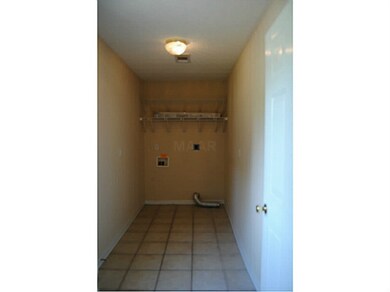 Laundry Room, Tile Flooring.