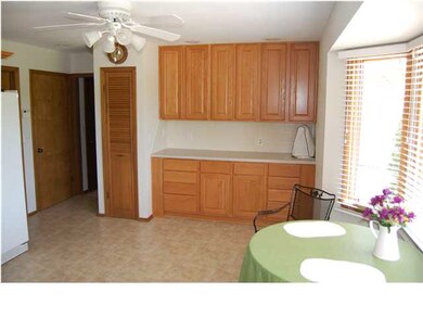 LARGE KITCHEN WITH BUILT-IN HUTCH OR SERVING AREA.
