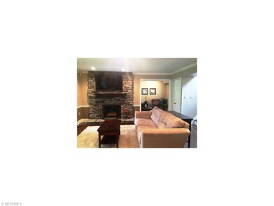 Stone fireplace adds to charm of living room