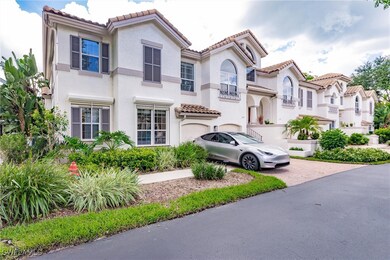 Mediterranean / spanish house featuring decorative driveway, stucco siding, an attached garage, and a tiled roof
