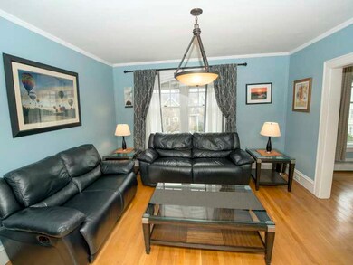 Living Room. High ceilings and hardwood floors