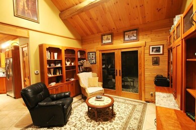 Library area with custom cherry...