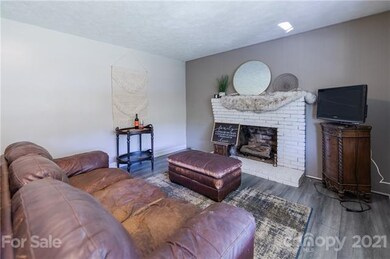 Cozy on up to the fireplace in the Living room.