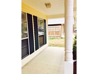 Facade/Exterior Front. Shady front porch for relax