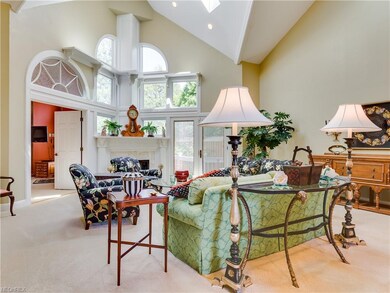 Soaring ceilings and a wall of windows frame the c