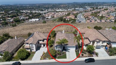 Elevated lot with gorgeous views all the way to ocean on a clear day!  You can watch 3 sets of fireworks from your own yard on the 4th of July.  Home feels very privately situated on the parcel.
