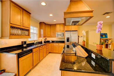 custom kitchen, granite and stainless steel appliances