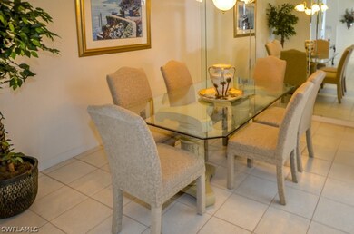 Formal dining room has custom mirror and tray ceil