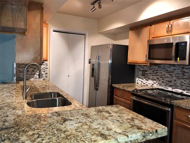 Notice the Granite countertops.