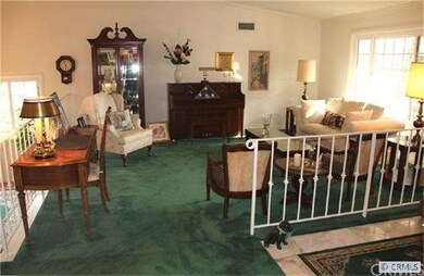 Living Room with cathedral ceiling...An open & spa