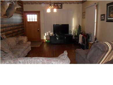 Living Room with original hardwood floors.