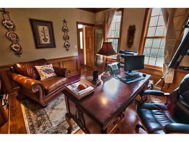 Den. STATELY DEN WITH BUILT-INS.