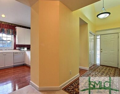 Other. Hardwood Floors Flow From the Foyer into th