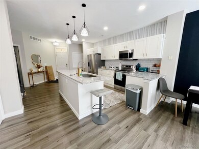 12253 E 2nd Dr, Aurora, CO 80011 - photo 2