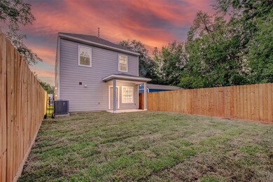 973 Reverend b j Lewis Dr, Houston, TX 77088 - photo 2